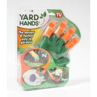 Packaged pair of green and orange gardening gloves with built-in claws in clear plastic packaging