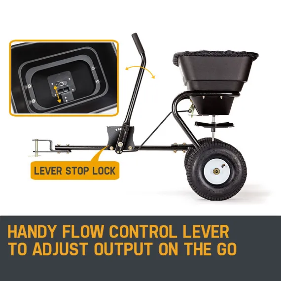 Side view of a tow-behind spreader with hopper, wheels, hitch, and adjustable flow lever