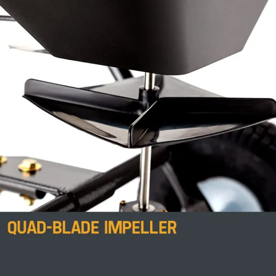 Close-up of a black four-blade impeller beneath a hopper, with a metal center shaft